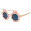 Gafas de sol rosa redondas con lentes azules